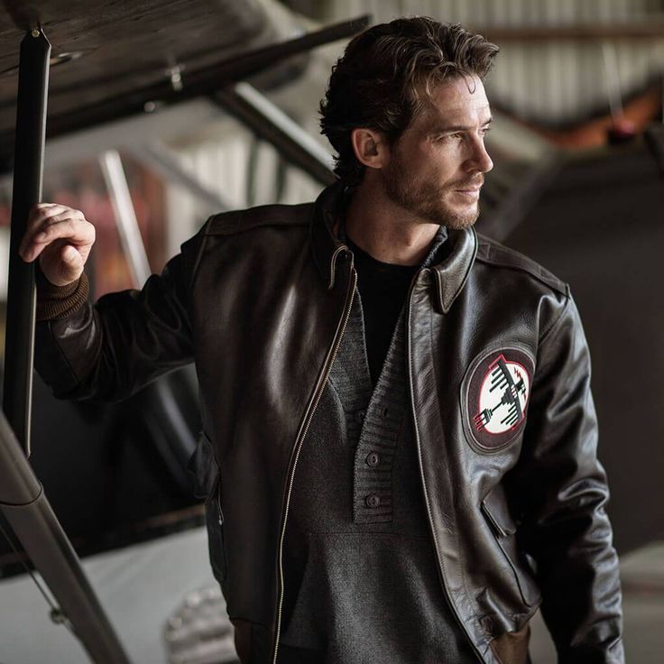 man wearing military flight jacket 